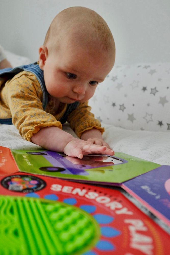 How to encourage tummy time (even if your baby hates it)