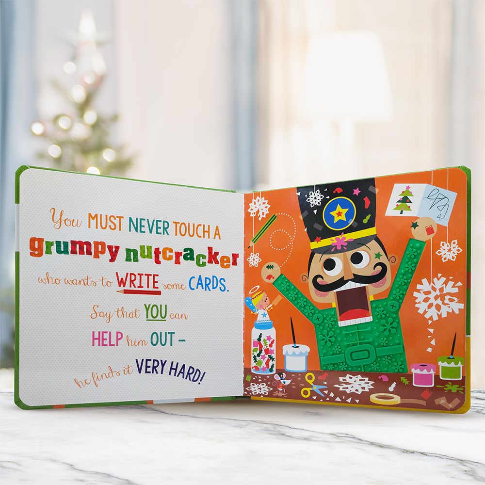 Product image 4 of Never Touch a Grumpy Reindeer!, a board book for ages 0+, by Make Believe Ideas.