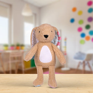 Product image 3 of Sensory Snuggables Medium Plush Bunny with Cloth Book, a plush toy for ages 0+, by Make Believe Ideas.